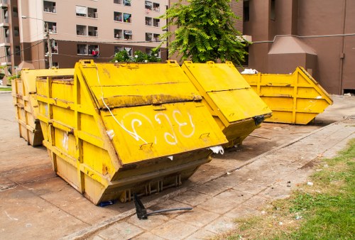 Rubbish removal service trucks in Chessington