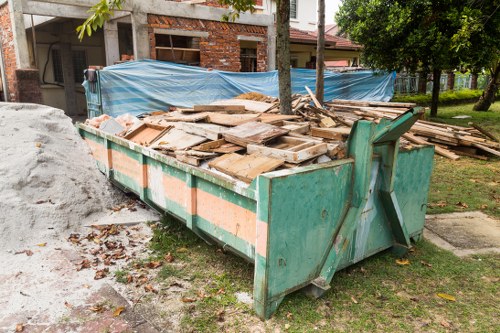 Warning signage and PPE at waste collection site