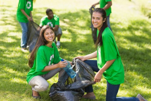 Waste removal service team at work on a construction site