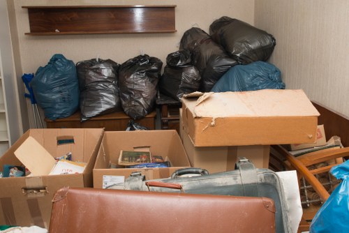 Eco-friendly enclosed skip ready for waste disposal in Chessington